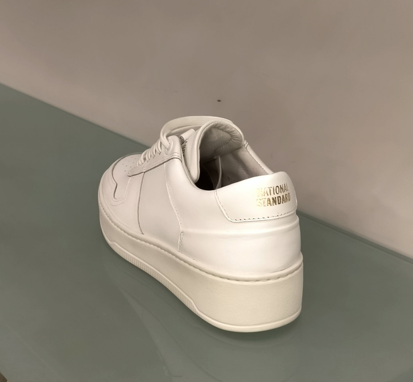 Sneakers NATIONAL STANDARD in pelle bianca